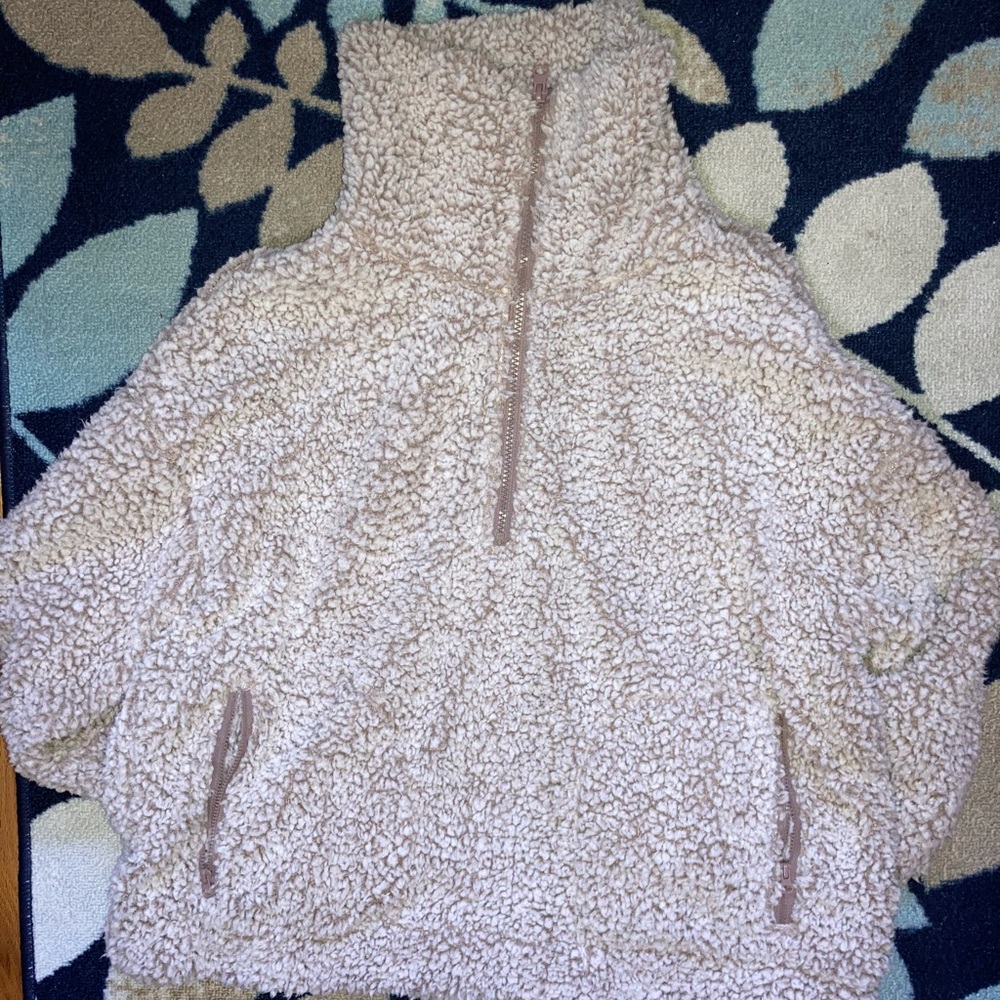 Extremely Fluffy, high neck quarter zip.